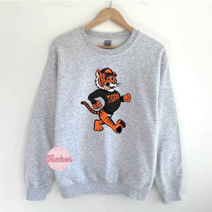 VINTAGE ORANJE SWEATER MET TIJGER voor wholesale door Tucker with a Tee