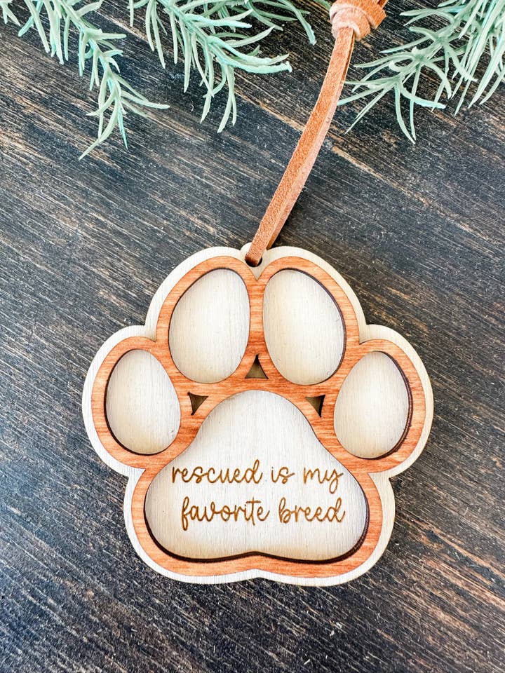 Rescued is My Favorite Breed Dog Paw Christmas Ornament for wholesale by Hazel + Bloom Co