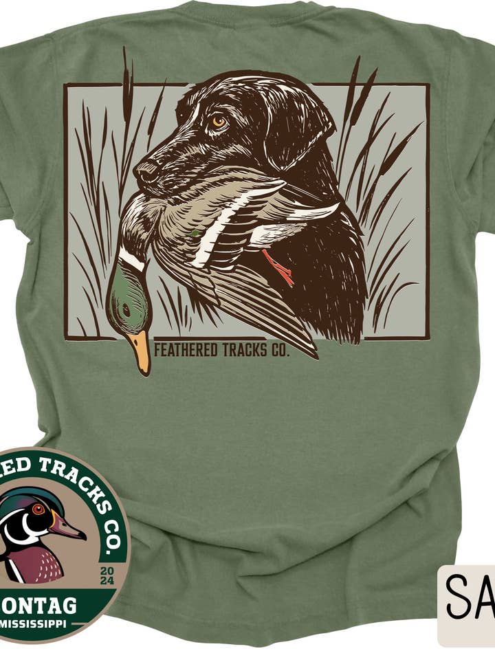 Black Lab with Duck for wholesale by Feathered Tracks Co.