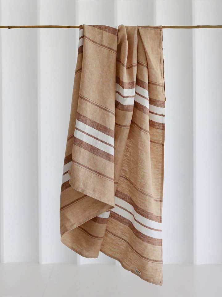 Linen beach blanket in French striped for wholesale by MagicLinen (We handle U.S. import procedures for you)