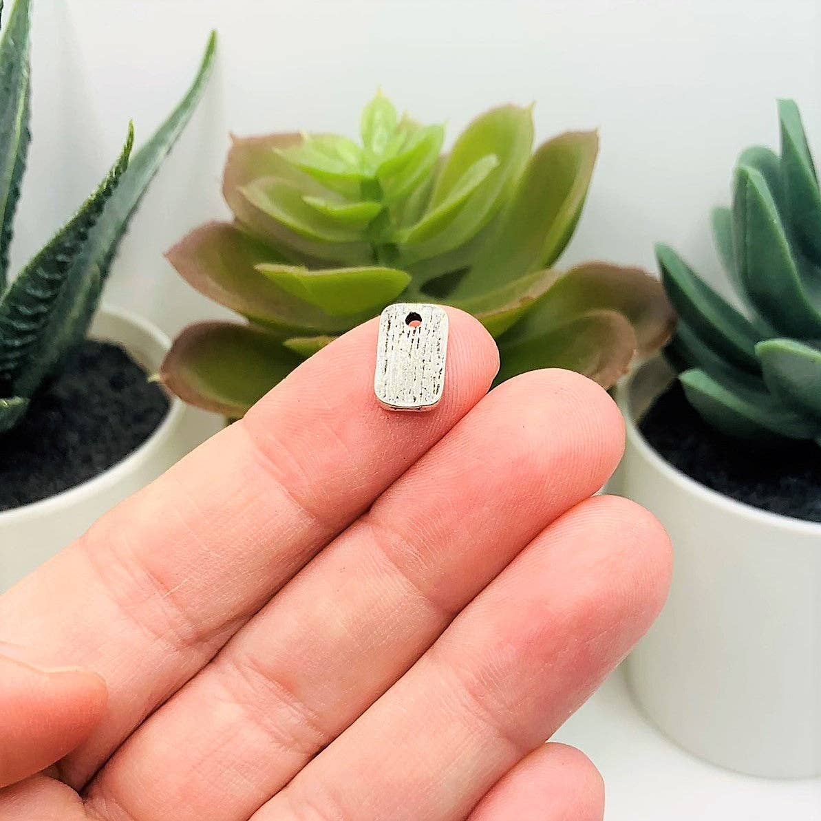 Guerrilla Charm – wholesale Individual charm/pendant – Tiny Silver You Are Loved Affirmation Charms, 11x7mm2