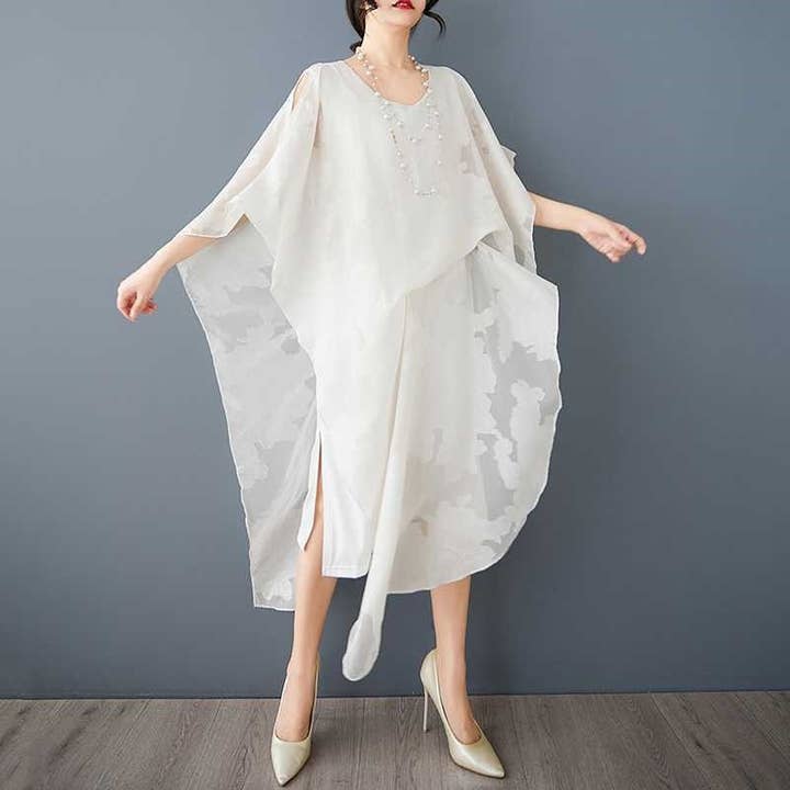 Abito alla moda a taglio ampio irregolare taglie forti per la vendita all'ingrosso da parte di OceanusSwim