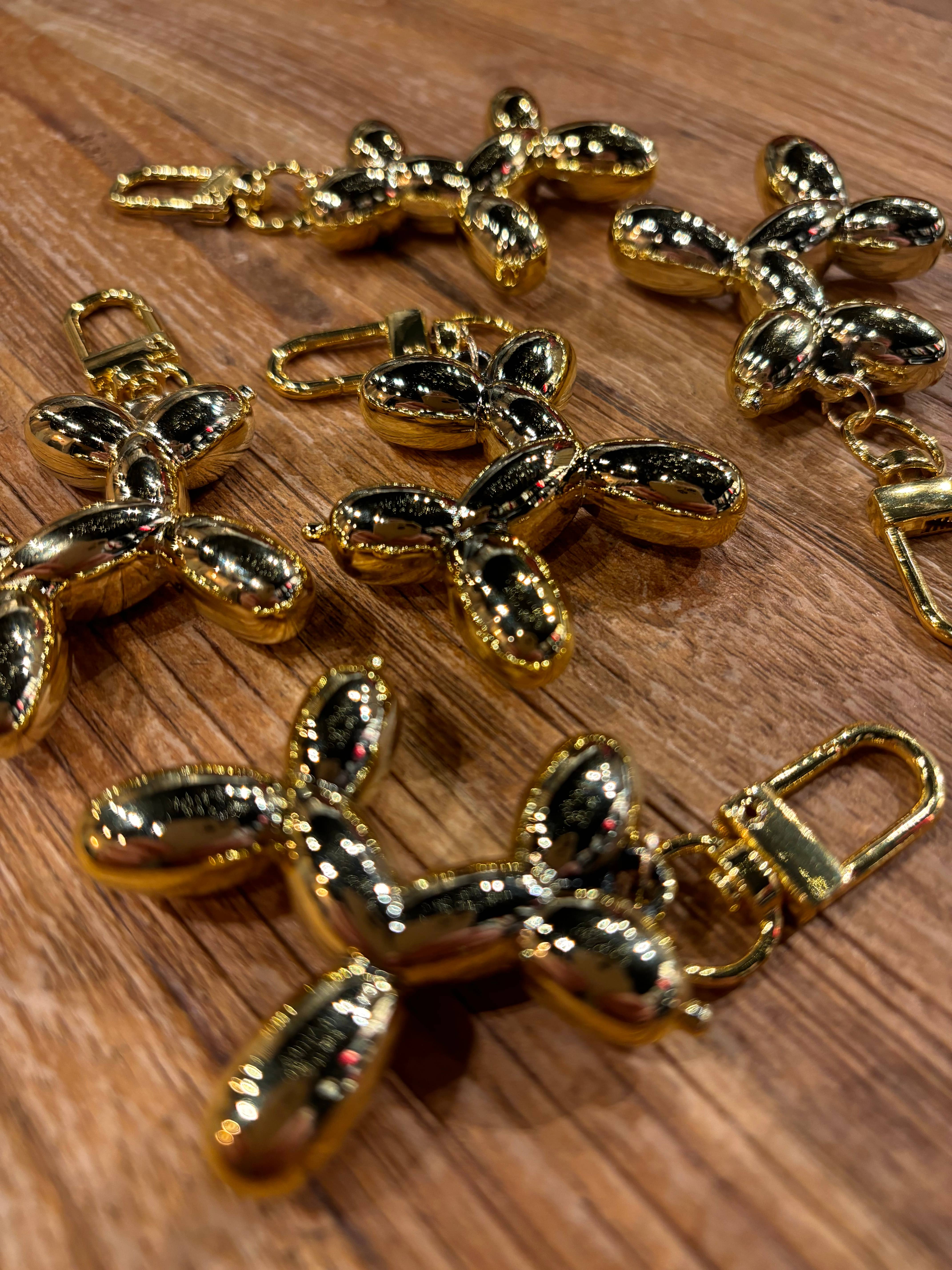 Goud Sleutelhanger ballonhondje GOUD voor groothandel op Faire2