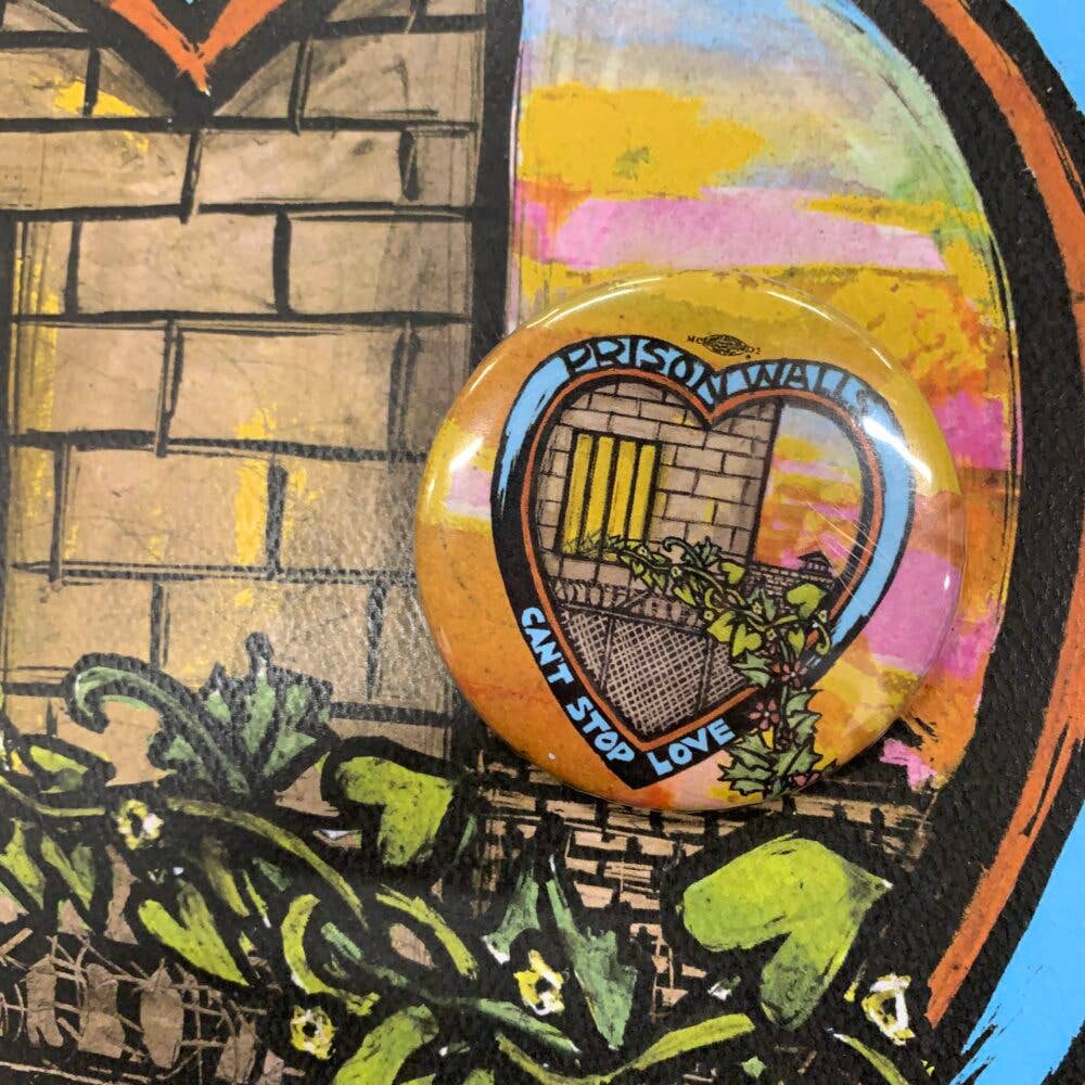 Ricardo Levins Morales Art Studio - Wholesale Lapel Pin/Button - Prison Walls Can't Stop Love Button0
