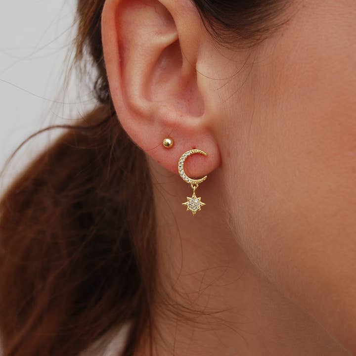 Sterling silver moon earrings with small star, set 4 pieces. for wholesale by Yneda Jewels