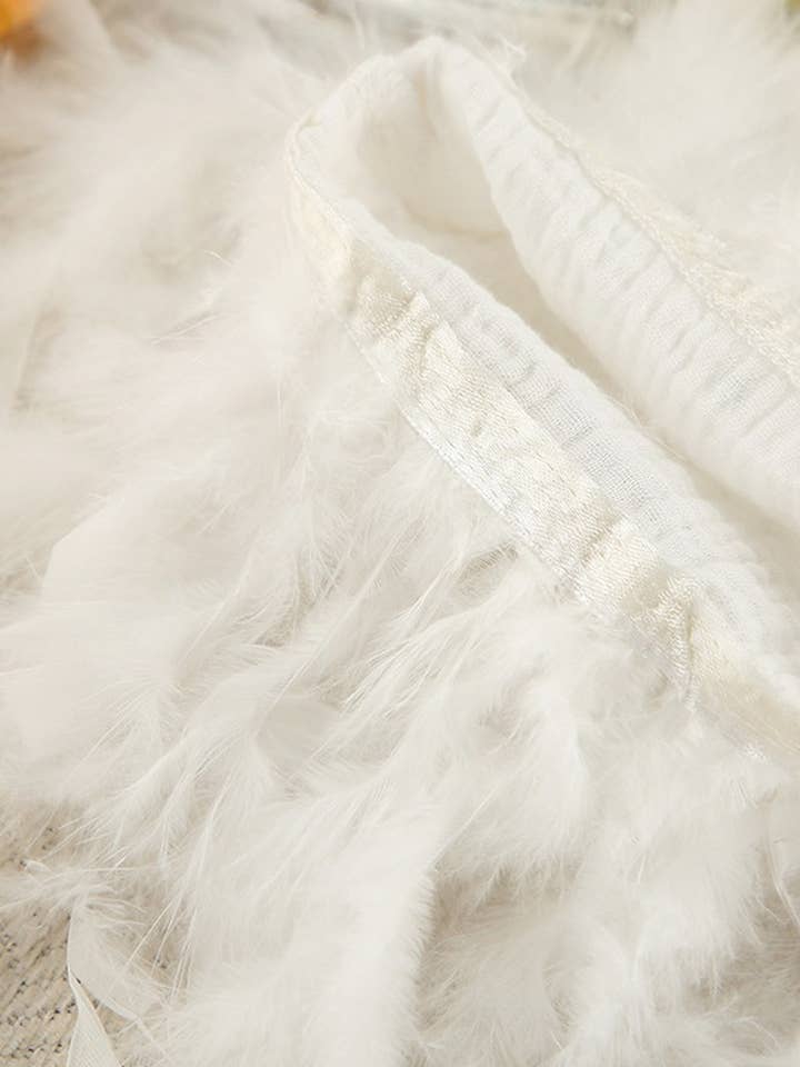 BLANC CWSPJ0311_PYJAMA COURT À MANCHES LONGUES EN COTON PUR AVEC PLUMES en vente sur Faire7