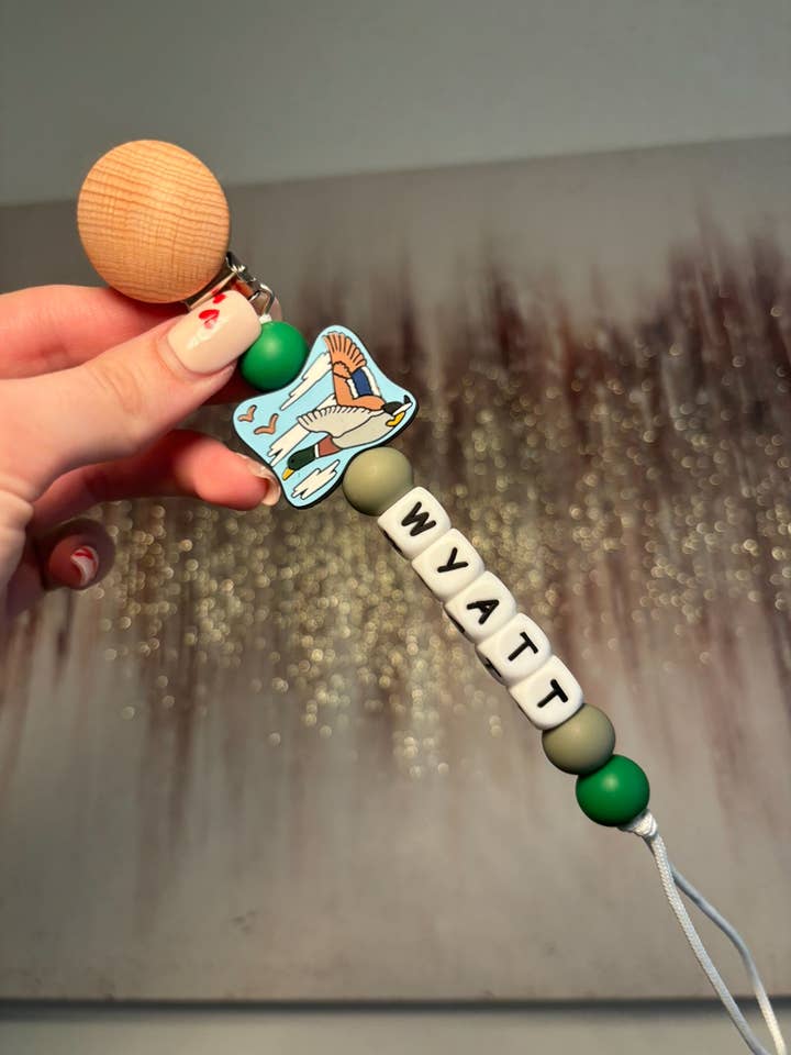 Custom name mallard Duck Paci teething clip for wholesale by Clip and Coast