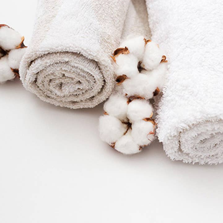 Pair of solid color sponge towels and other Purchase Wholesale set di asciugamani da bagno. Free Returns & Net 60 Terms on Faire trending on Faire.