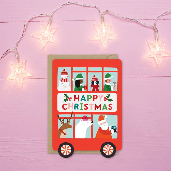 Carte de Noël en forme de bus des vacances du Père Noël pour la vente par Mifkins