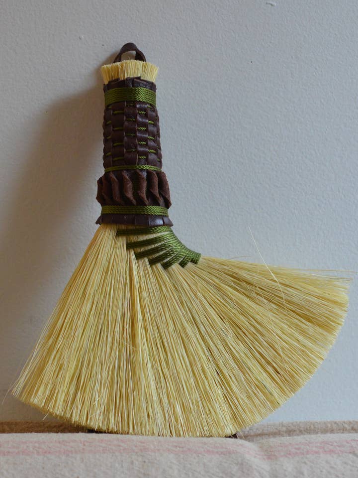 Agave Fiber Hen's Wing with Reclaimed Leather Plaited Handle for wholesale by C. Murphy Does...