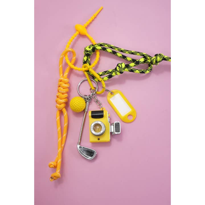 Gold ROPE CORD CAMERA GOLF BAG CHARM KEYCHAIN | 40KC145 for wholesale on Faire