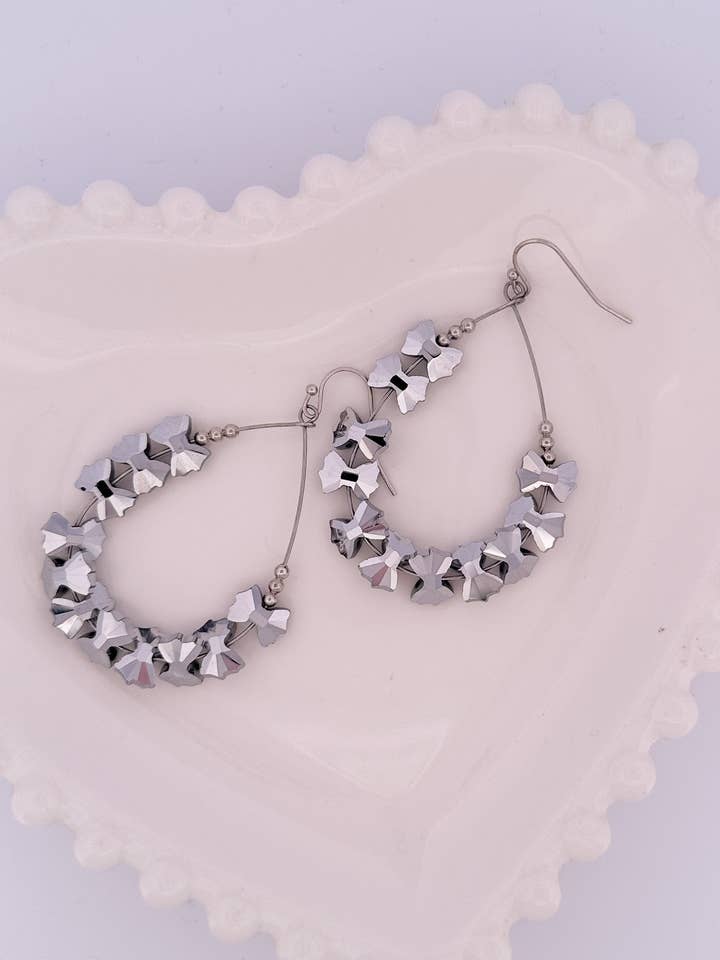 Lifes A Party Earrings for wholesale by Nette Road Wholesale