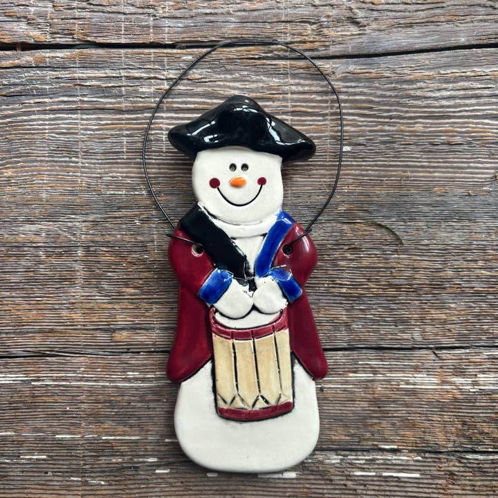 Colonial Snowman Ornament-Minutemen with a drum for wholesale by August Ceramics