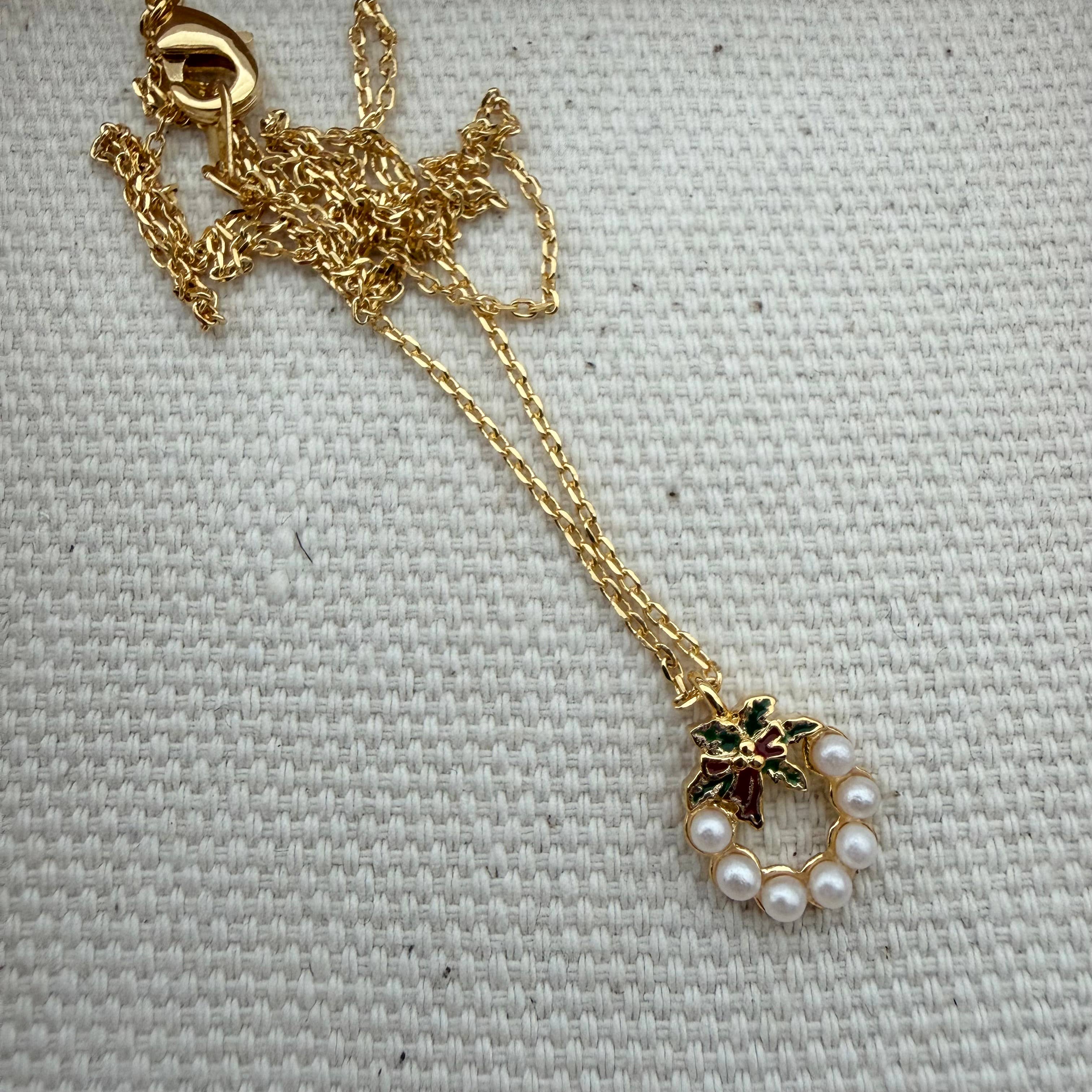 Gold Holiday Wreath Necklace for wholesale on Faire7