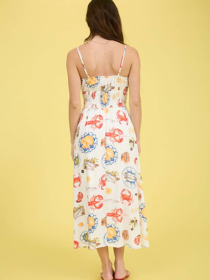 IVORY MULTI SEASIDE LUNCH PRINT SPAGHETTI STRAP MIDI DRESS for wholesale on Faire