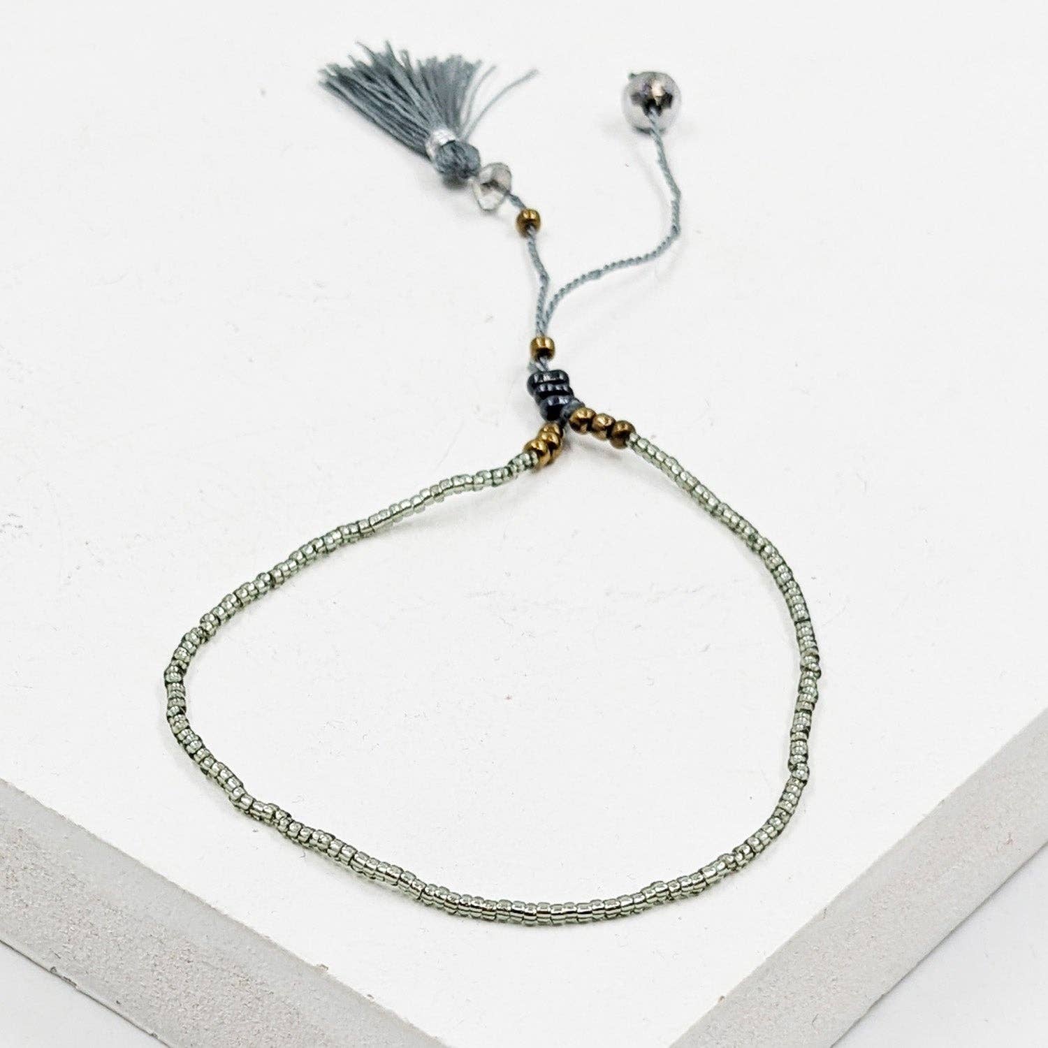 Tempest Designs – wholesale Beaded bracelet – Delicate Japanese Seed bead friendship style bracelet with tassle0