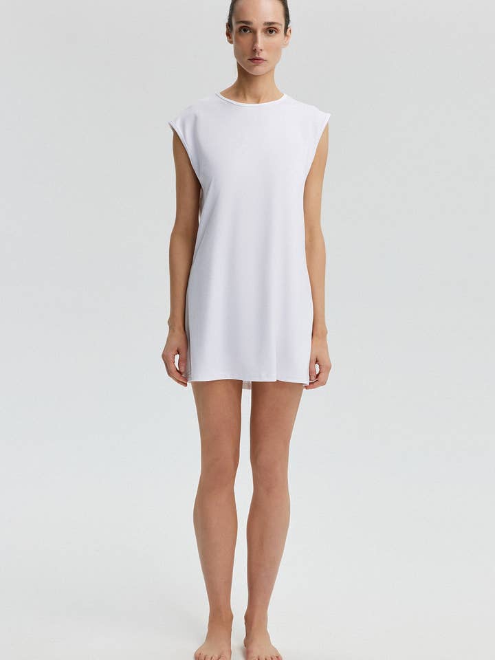 MINIMALISTISK ÆRMELØS LANG TUNIKA - CREME for engroshandel hos Touché Privé