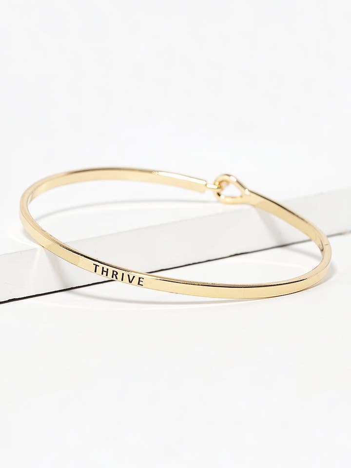Thrive Engraved Inspirational Bangle Bracelet for wholesale by Wild Honey
