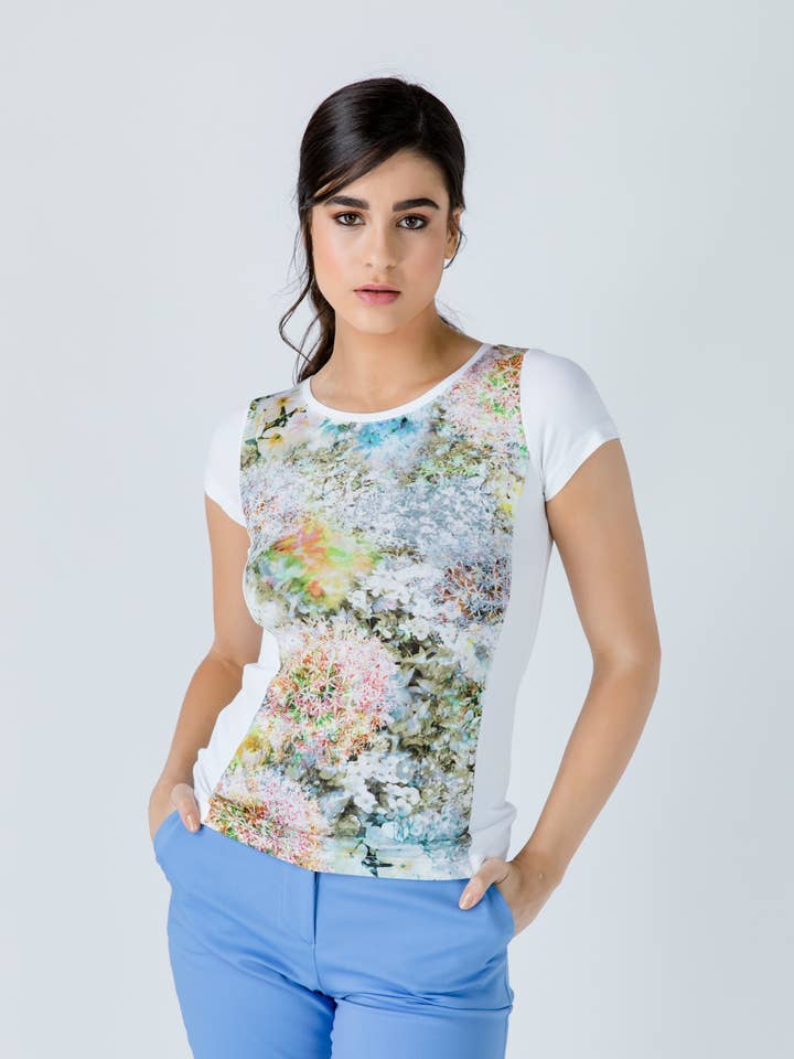Top blanc à manches courtes à imprimé floral pour la vente par conquista