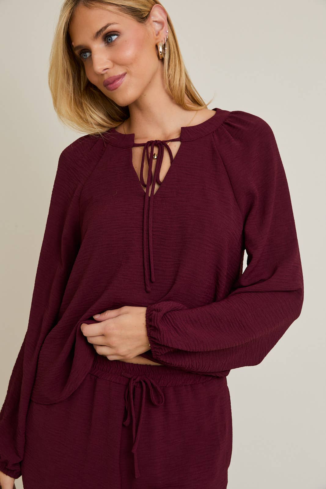 WINE FRONT TIE LONG SLEEVE TOP for wholesale on Faire4