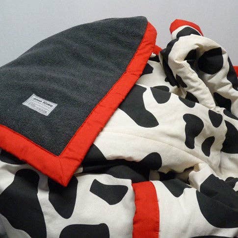 Mysig filt med ko-mönster från anna blume textilmanufaktur för wholesale av anna blume textilmanufaktur
