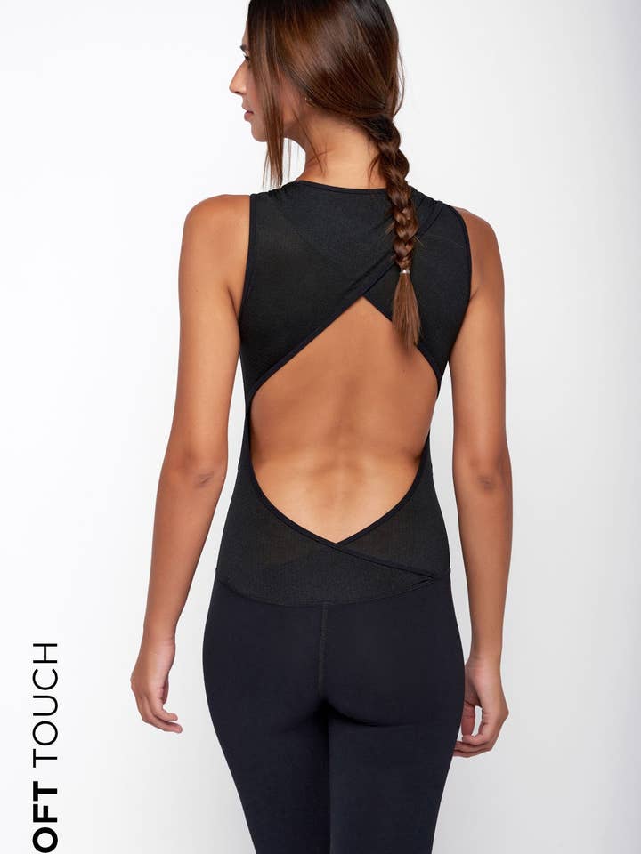 Jumpsuit nera SAVASANA per la vendita all'ingrosso da parte di YUJ PARIS