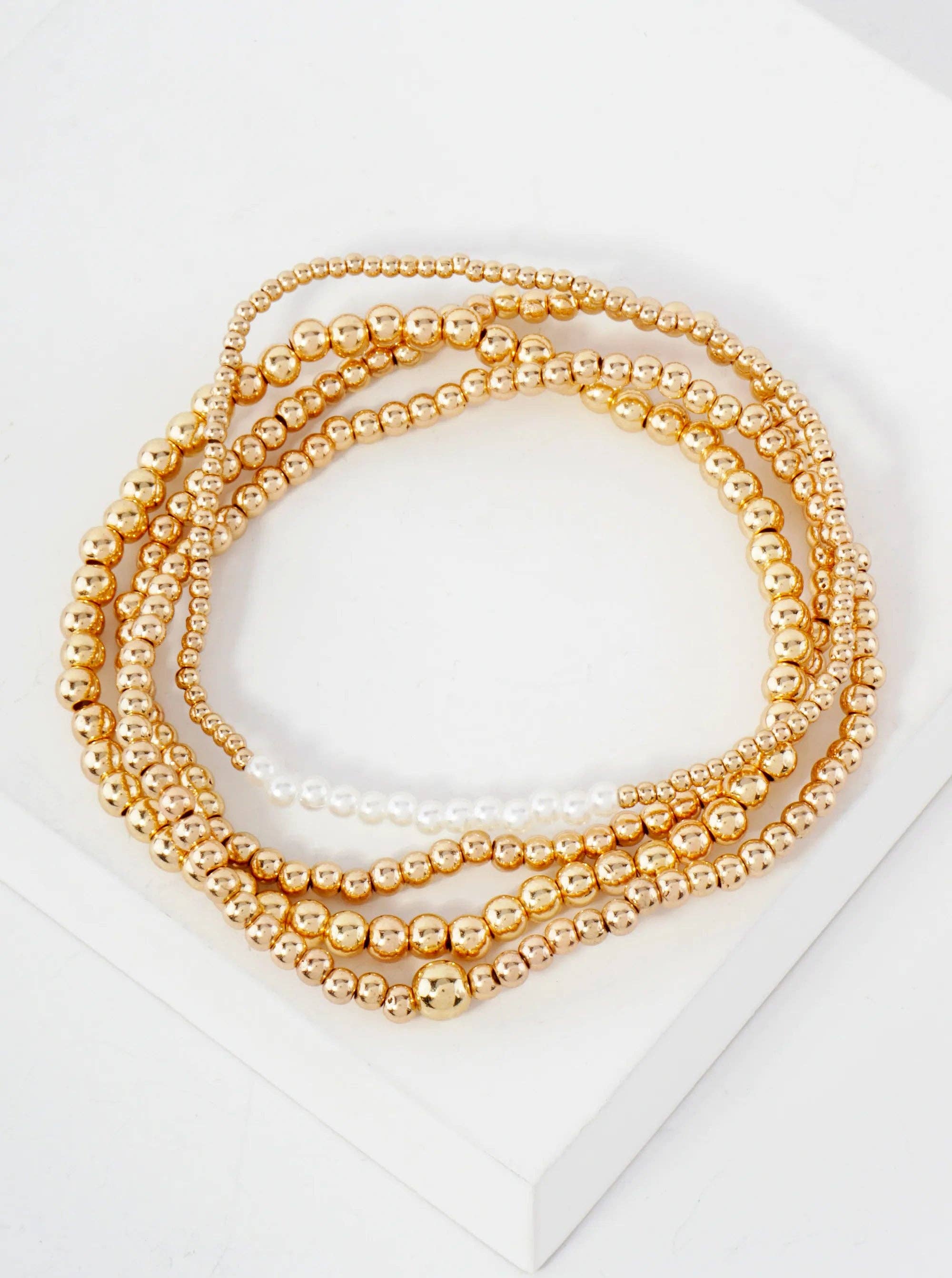 GOLD CREAM 4PC-Set Metallic Beads Pearls Stackable Stretch Bracelets for wholesale on Faire1