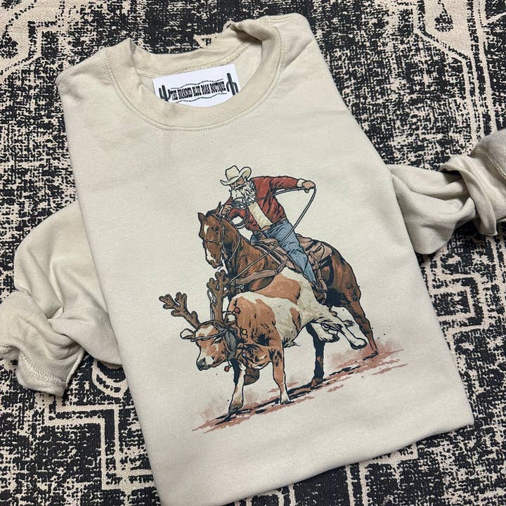 The Branded Blue Roan - Wholesale Screen Printed T-Shirt - Women's - Western Roping Santa Christmas Graphic