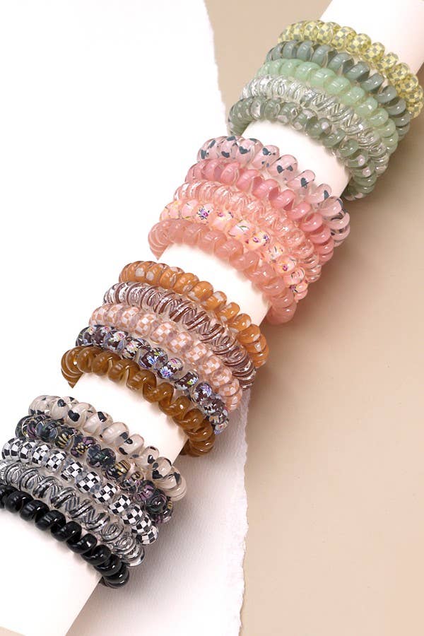 JOSSLYN by wall to wall – wholesale Hårsnoddar – Dam – JOSSLYN by wall to wall Spiralformade hårsnoddar med blommönster och djurtryck, 5-pack4