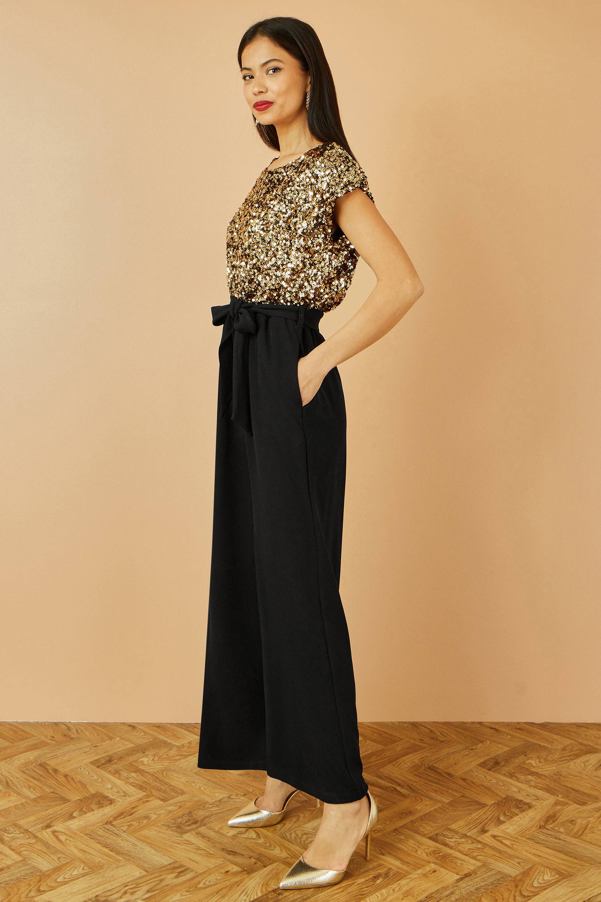 Yumi Gold Sequin Top Stretch Jumpsuit for wholesale on Faire1