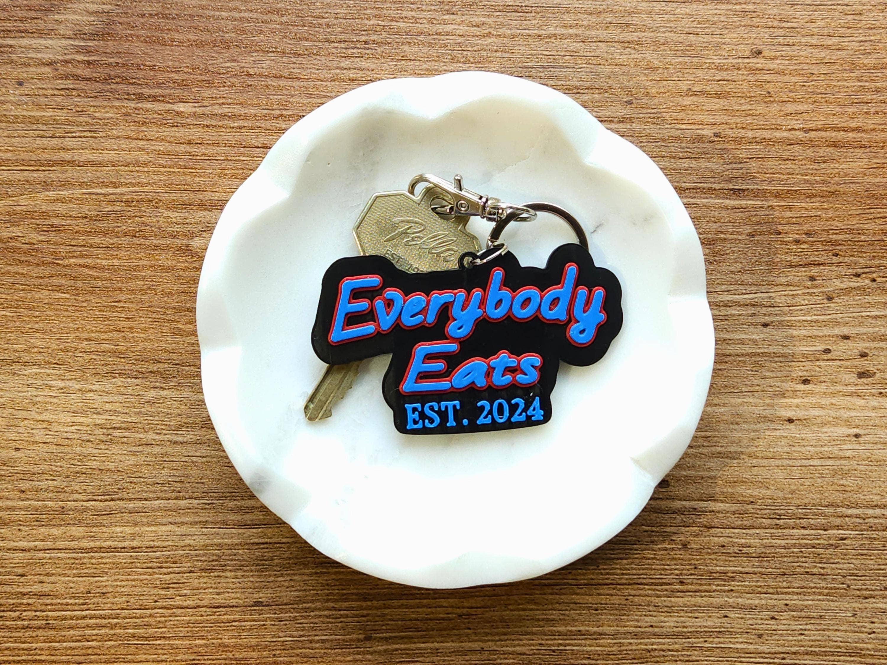 ModoWorks - Wholesale Keychain - Unisex - Everybody Eats Est 2024 Keychain