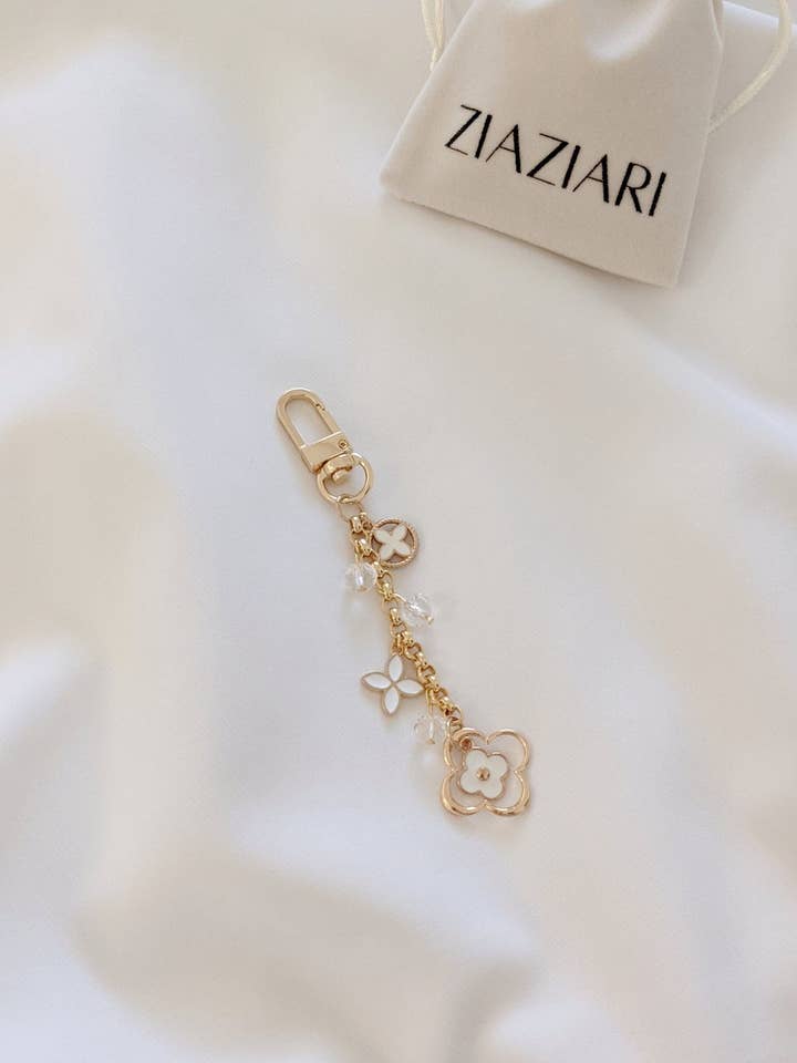 Florecientes Blanca nøglering Charm for engroshandel hos Ziaziari