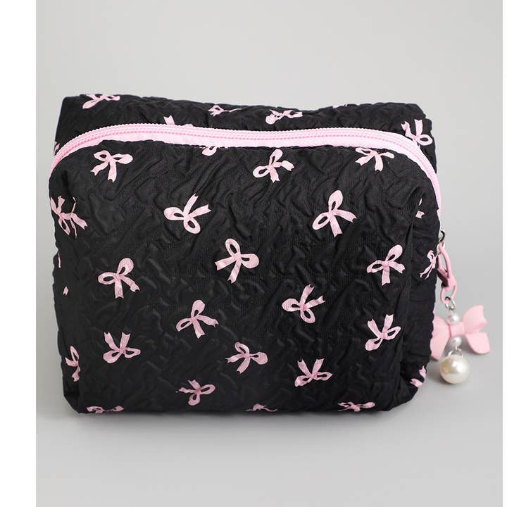 TEXTURED BOW MAKEUP TRAVEL POUCH for wholesale by Girly