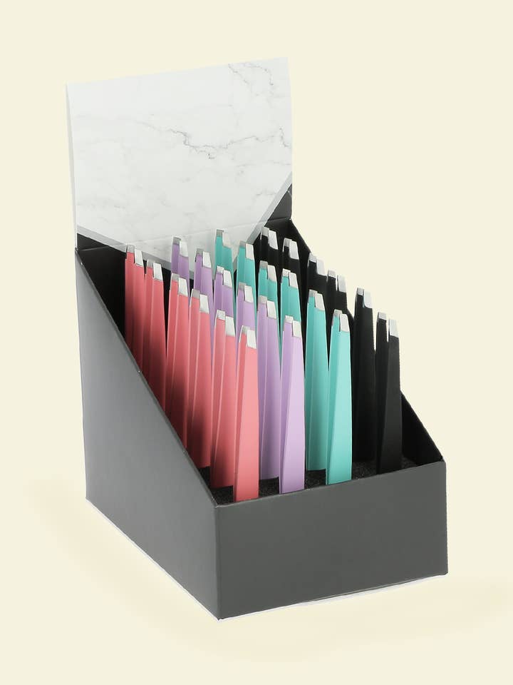 Display of 24 tweezers with a biased soft touch for wholesale by JCH BEAUTY ACCESS