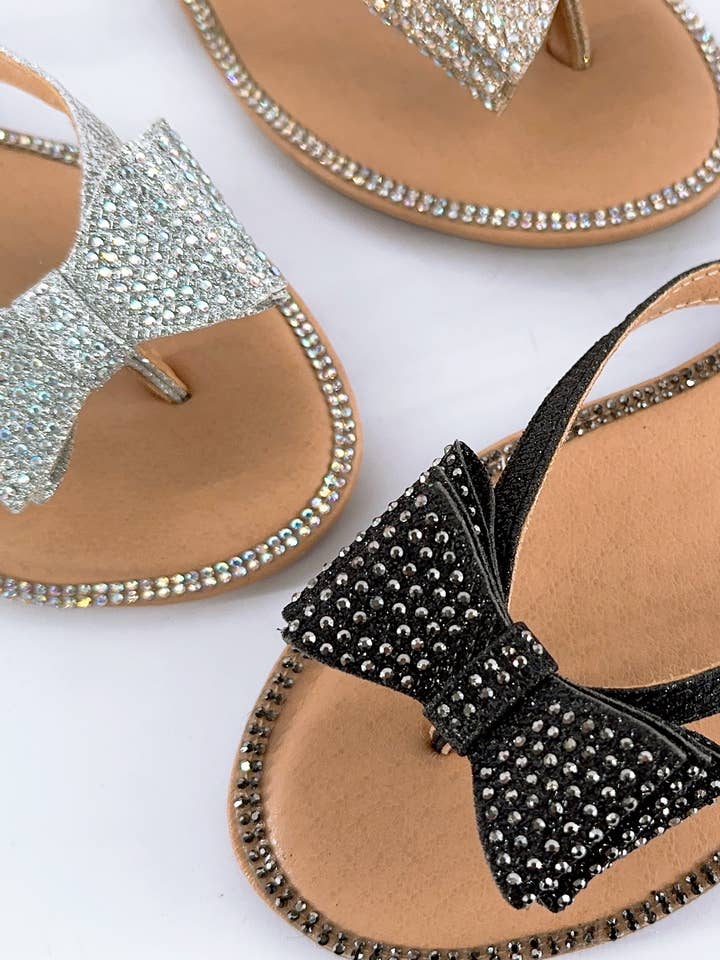 CHAMPAGNE FANNIE JEWELED BLING BOW THONG SLIDE for wholesale on Faire