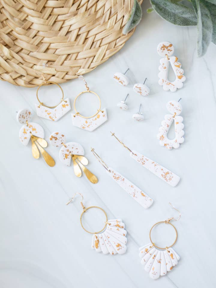 Colección en copos de oro para venta al por mayor de EJ Clay Co