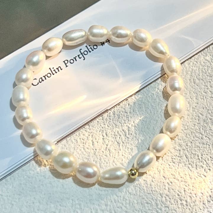 Elegant hvid perlearmbånd med guldkugle for engroshandel hos digsell
