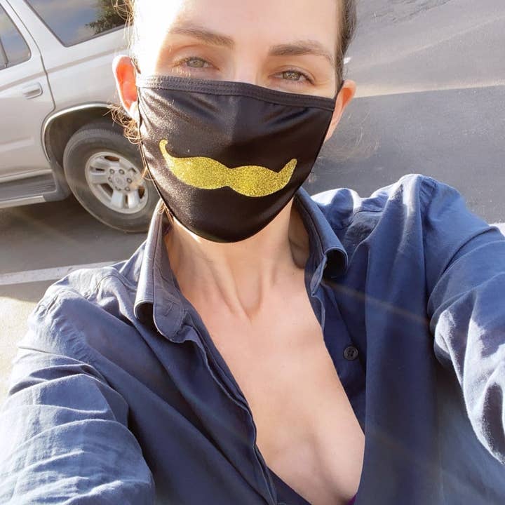 Mr. Mustachio Gold Glitter Face Mask for wholesale on Faire2