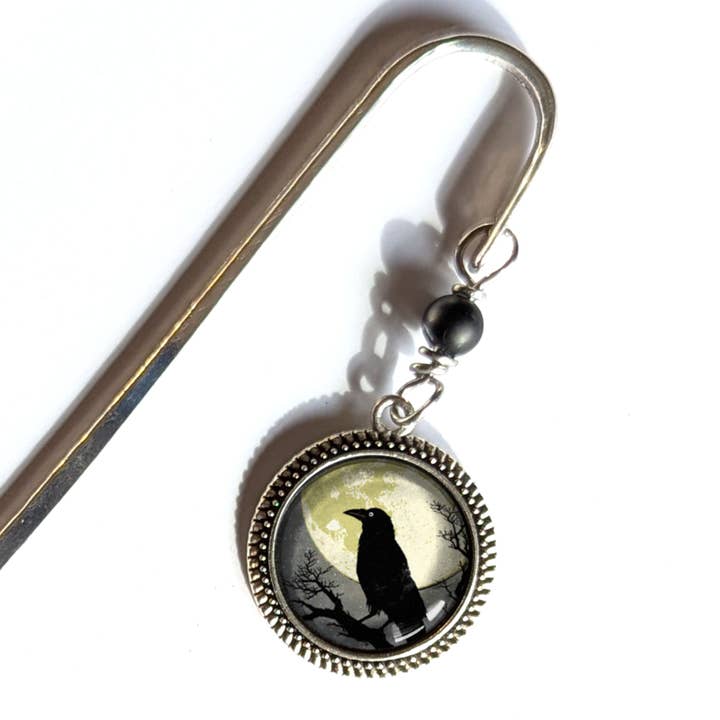 Raaf met Volle Maan Metalen Boekenlegger voor wholesale door Brainmeats Atelier