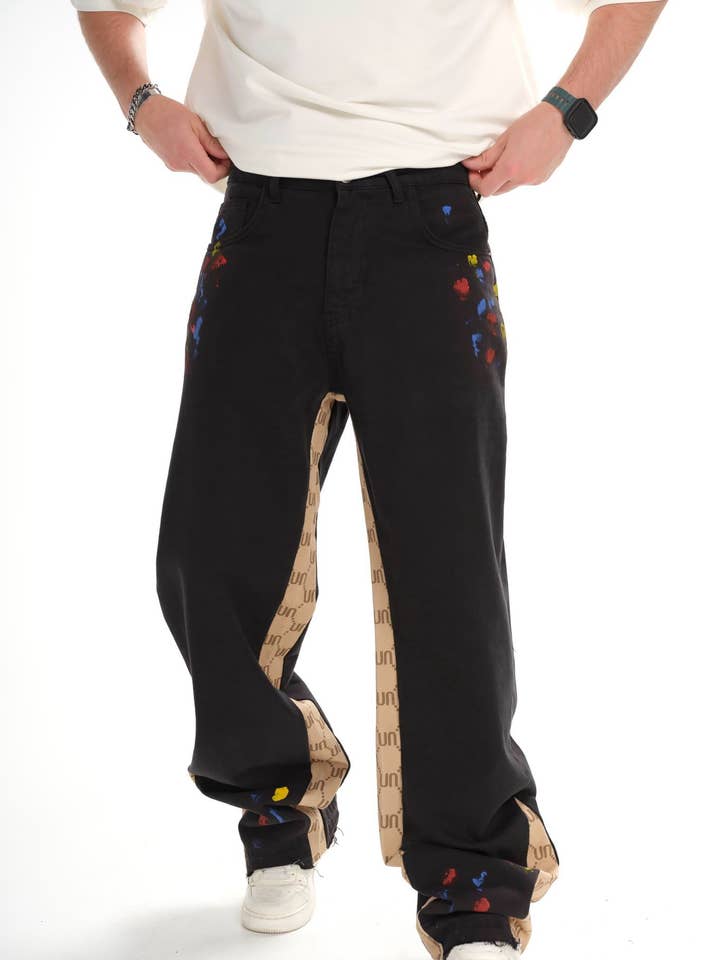 Jeans designer in denim a strati spruzzati e larghi. per la vendita all'ingrosso da parte di PremiumDenim