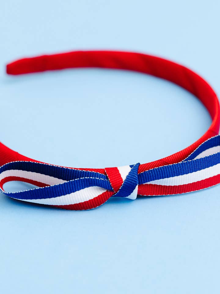 Cerchietto «Lottie» rosso, bianco e blu per la vendita all'ingrosso da parte di Winn and William