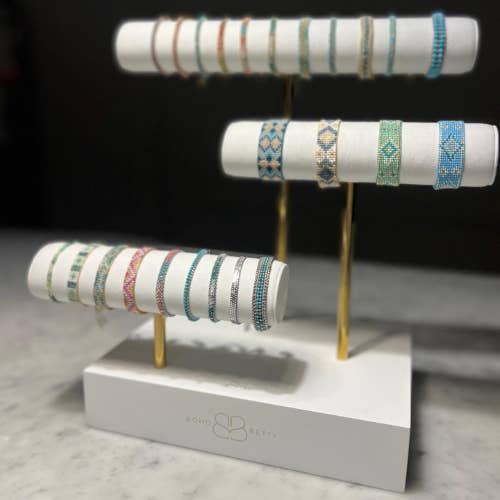 Boho Betty – wholesale Jewellery stand & display – Boho Betty Three Tier T-Bar Faux Suede Display Stand – Gold & White Multi-Level Bracelet Holder