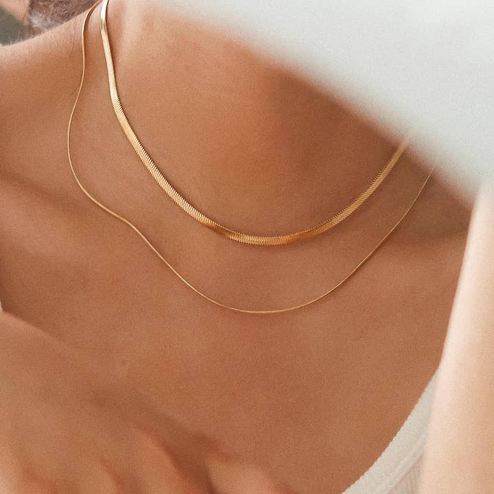 Jean 18K Gold Non-Tarnish Layered Flat Snake Chain Necklace and other Purchase Wholesale gold filled chains. Free Returns & Net 60 Terms on Faire trending on Faire.