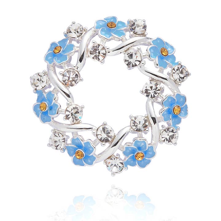 Broche ronde en argent plaqué "Forget Me Not" pour la vente par Joe Davies