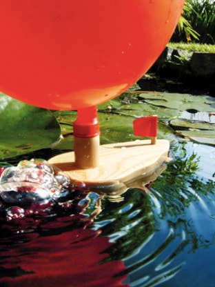 Wooden rattle boat for wholesale by Montessori Baby