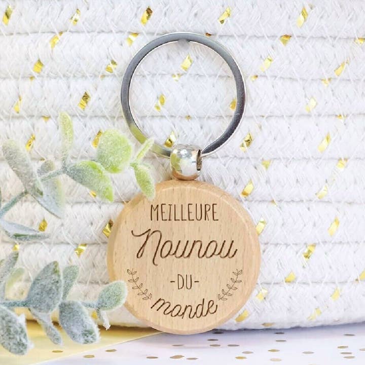 “Best Nanny” round wooden keychain for wholesale by Ourson Câlin