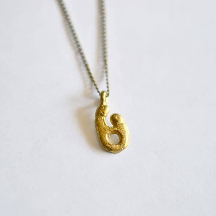 Small Mother and Child Pendant Necklace | Recycled Brass for wholesale by Alora Boutique Inc.