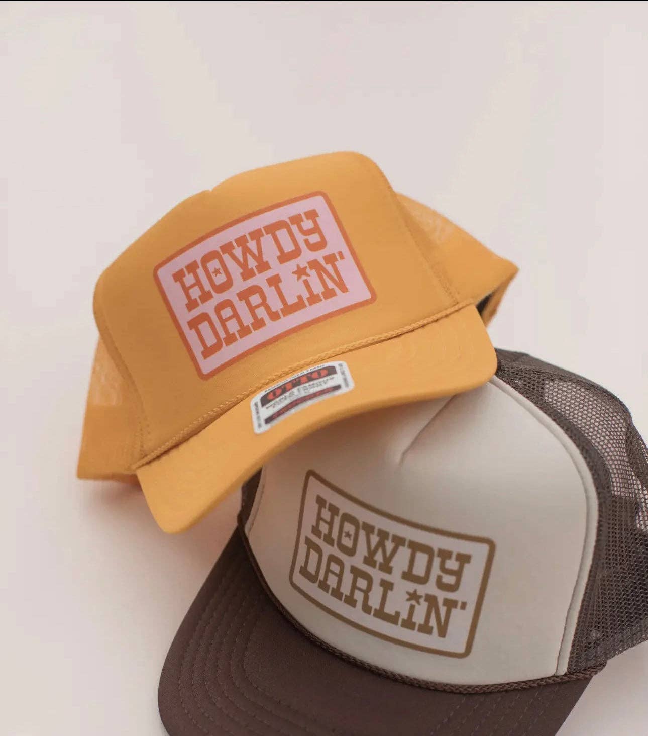Orange Howdy Darling Trucker Hats for wholesale on Faire0