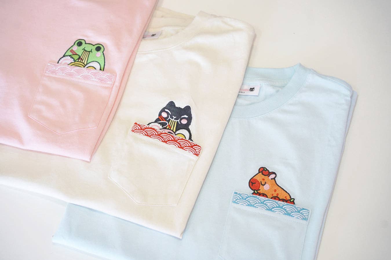 Jessthechen - Wholesale T-Shirt - Unisex - Bathing Capybara Embroidered Pocket Tee | Sky Blue5