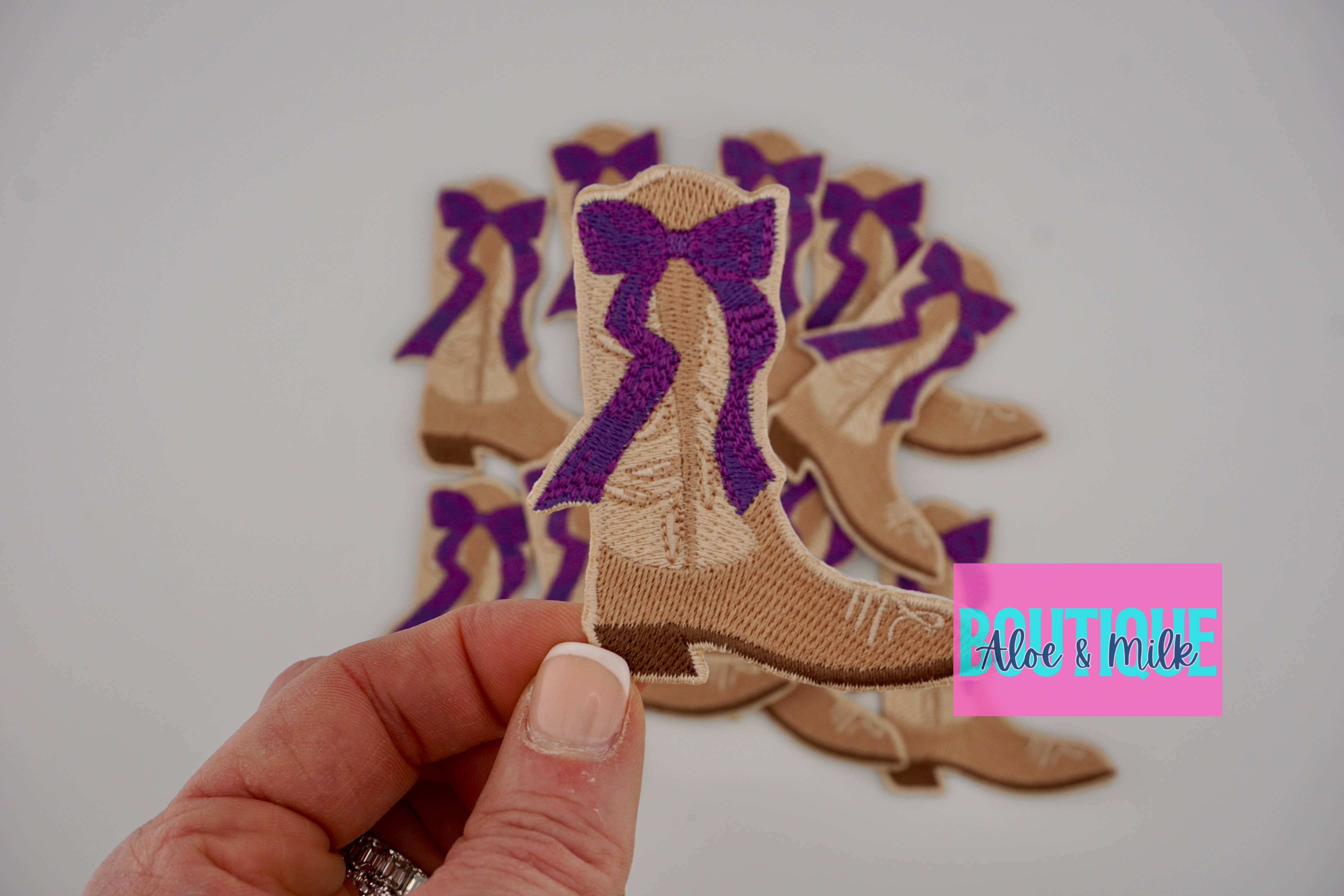 Aloe and Milk Boutique – wholesale Hat accessory – Women's – Boot with bow, western patch, cowgirl, cowboy, texas patch5